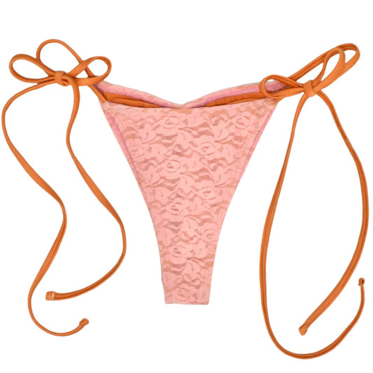 String bikini bottom with pink lace and orange backing and orange ties.